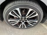 a close up of a tire on a car ' s rim