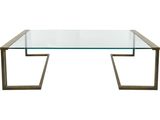 une table basse en verre avec des pieds en métal et un plateau en verre