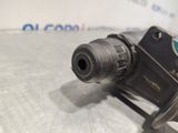 an image of a close up of a metal object on a table
