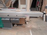 a picture of a table saw in a garage