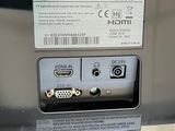 a close up of a cell phone with a cable attached to it