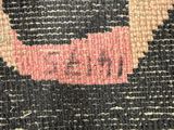 an image of a close up of a rug with a cat on it