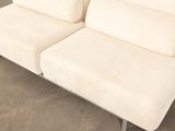 a white couch that is sitting in a room