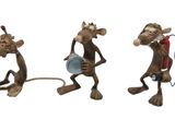three figurines of monkeys with a tennis racket and a tennis ball