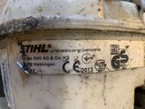 a close up of a white fire hydrant with a sticker on it