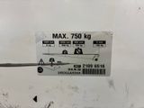 a label on the back of a white refrigerator