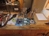 a counter top with a bunch of items on it