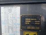 an image of a parking meter with a lot of stickers on it