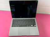 an apple macbook pro laptop is sitting on a pink surface