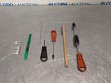 a lot of tools that are laying out on the floor