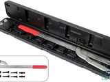 a close up of a tool in a case with a knife in it