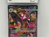 a close up of a pokemon card in a plastic case