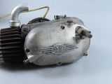 an old motorcycle engine that is sitting on a table