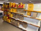 many boxes on the shelves in the store for sale
