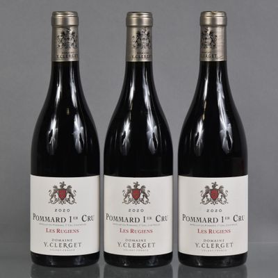 three bottles of wine sitting on top of a table next to each other