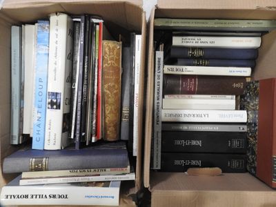 a box full of books sitting on a table