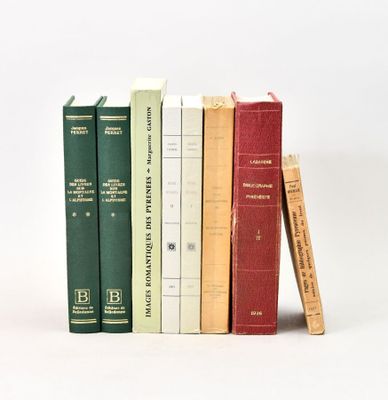 a few books that are stacked on top of each other