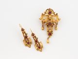 an image of a pair of earrings and a broochle