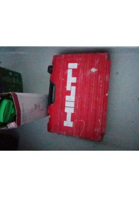 a red box with a white cross on it next to a green box with a white cross on it