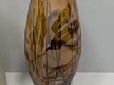 two vases that are sitting on a white table