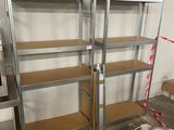 two shelves that are in the middle of a room