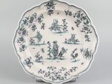 an image of a blue and white plate with birds and flowers on it