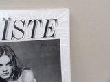 a magazine with a picture of a woman on it
