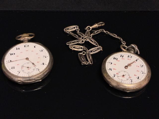Deux montres de poche « à gousset » en argent et chaine de montre...