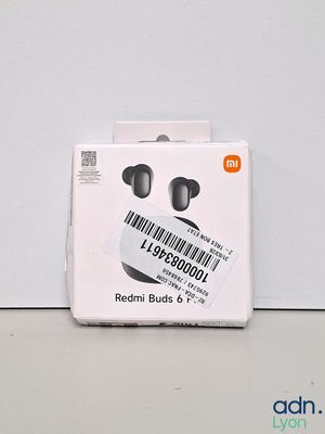 a box with a pair of ear buds in it