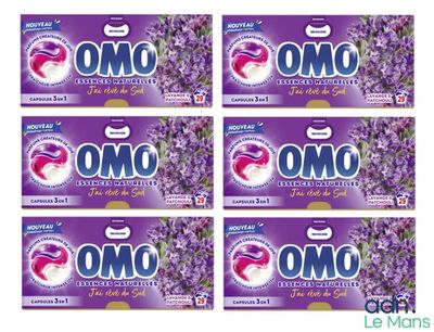 quatre paquets de lessive Om à la lavande, à la lavande