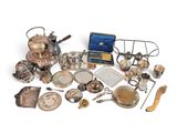 a lot of silver items that are sitting on the table
