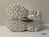 a close up of a pair of shoes on a table