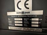 an image of a machine with a sign on it ' s side