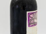 a bottle of wine that is sitting on a table