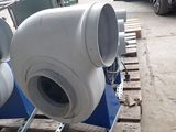 two blowers sitting on a pallet in a warehouse