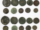 an assortment of ancient roman coins, including bronzes and bronzes