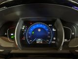 the dashboard of a car with a digital display on it