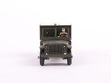 a toy army jeep with a man sitting in the back