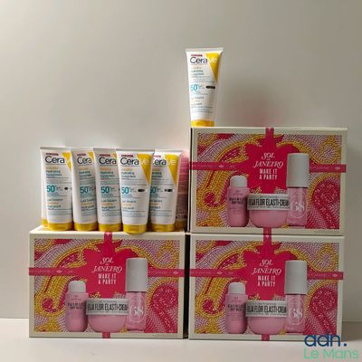three boxes of skin care products are stacked on top of each other