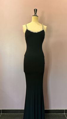 une robe noire sur un mannequin mannequin mannequin mannequin mannequin mannequin mannequin mannequin mannequin mannequin