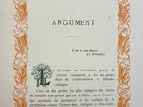 an orange and white book with a picture of a tree in the center