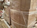 a large pile of cardboard sitting on a pallet
