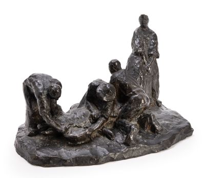 statue représentant un homme et une femme assis sur un rocher, accompagnés d'un chien