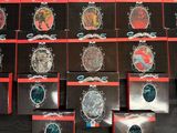 a lot of watches that are on display on the wall