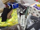 a pile of assorted items sitting on a table