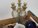 a tray that has a bunch of glass items on it