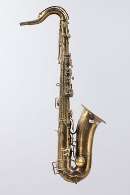 a close up of a saxophone on a white background