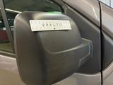 an image of a car door mirror with a sticker on it