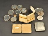 a lot of silver and gold items on the table