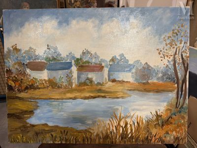 un tableau représentant une ferme au bord de l'eau, posé sur un chevalet